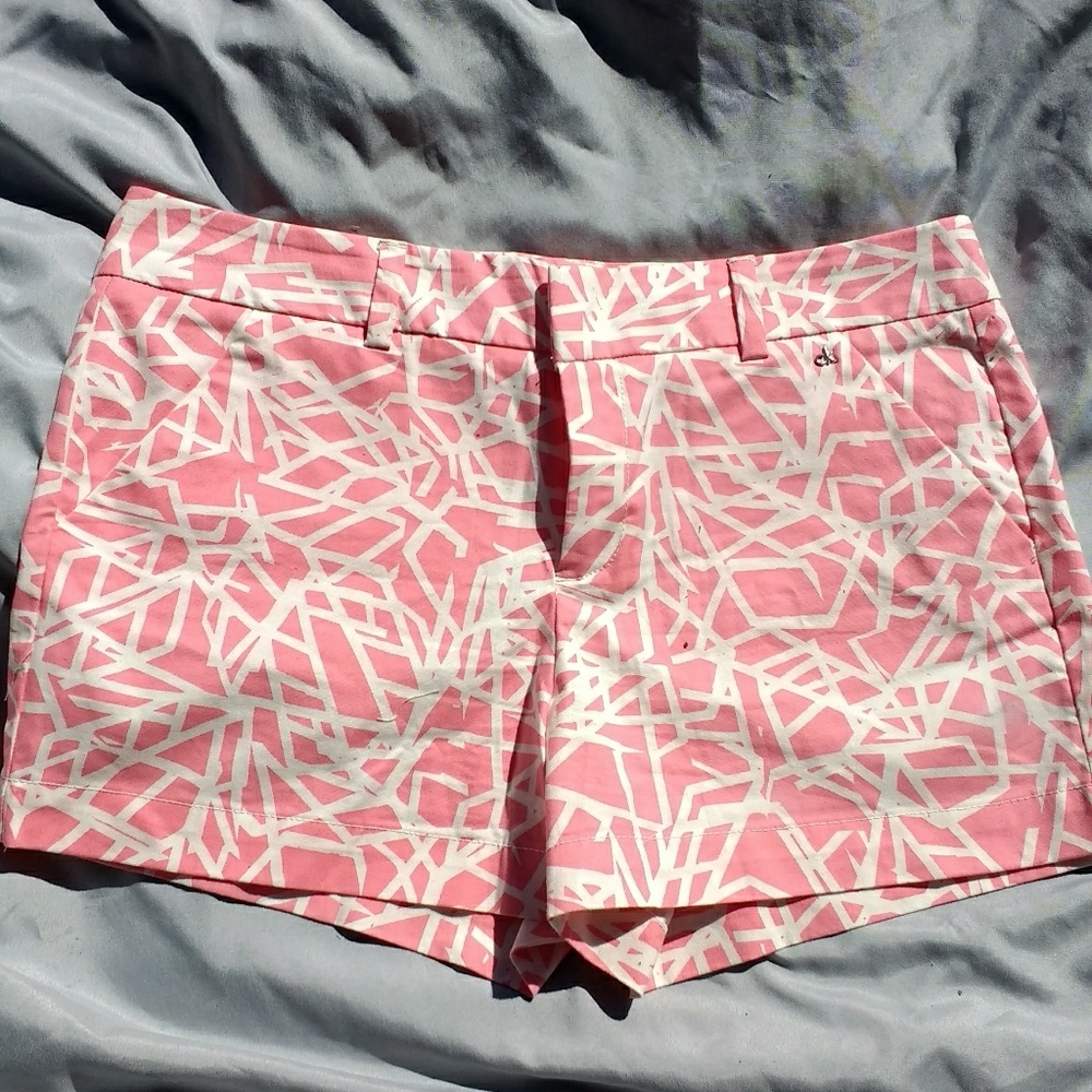 Calvin Klein pink and white shorts.